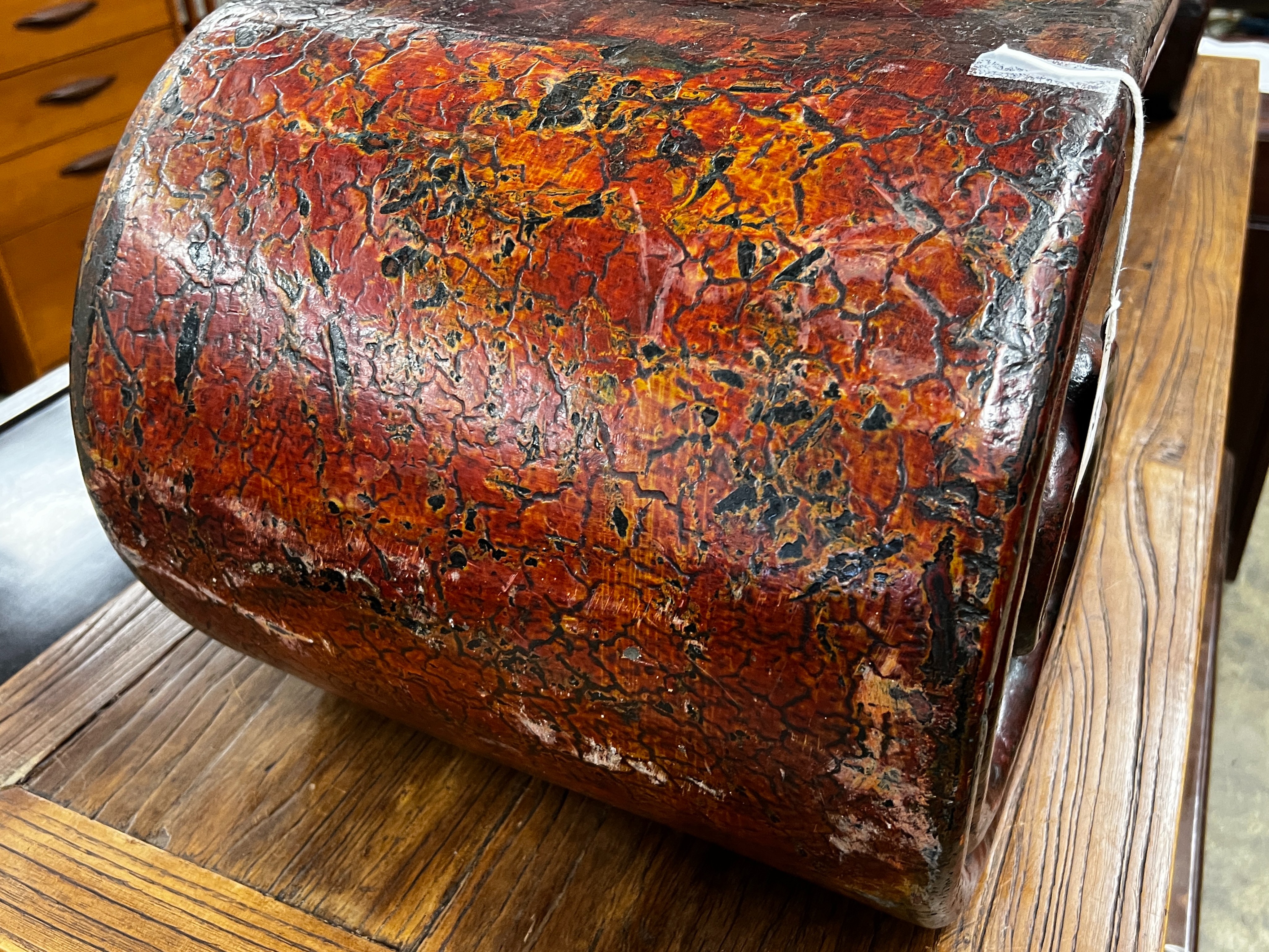 A Chinese lacquer scroll end low table, width 146cm, depth 35cm, height 33cm